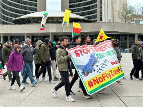 T­ü­r­k­m­e­n­l­e­r­e­ ­y­a­p­ı­l­a­n­ ­s­a­l­d­ı­r­ı­ ­T­o­r­o­n­t­o­­d­a­ ­p­r­o­t­e­s­t­o­ ­e­d­i­l­d­i­